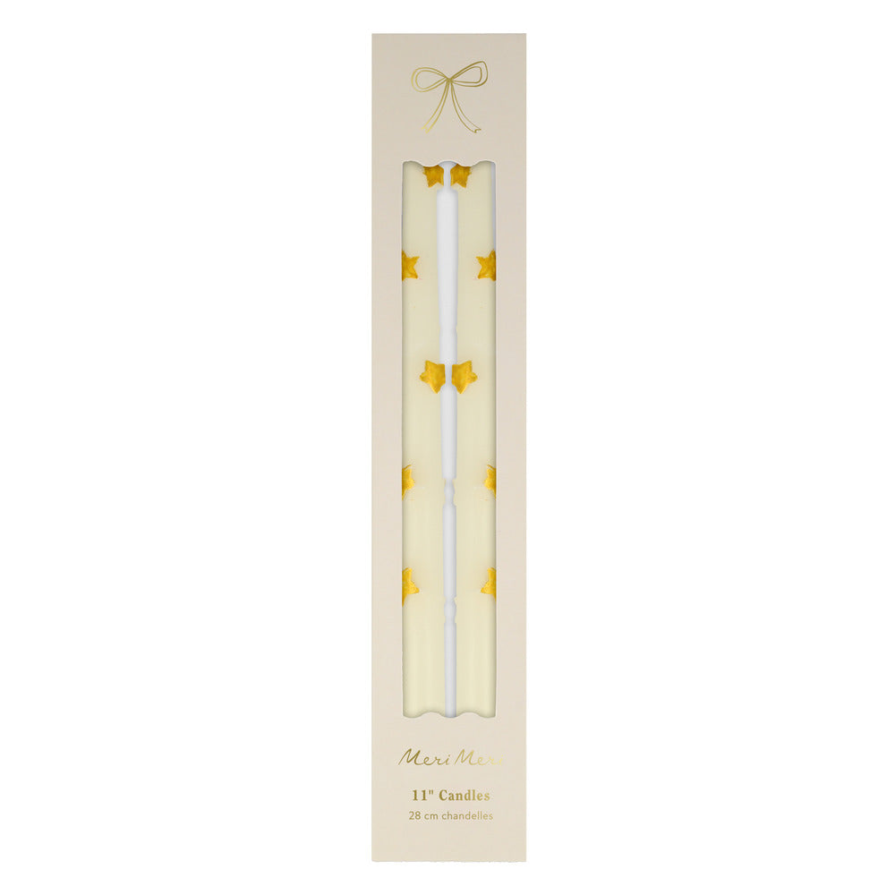 Velas de mesa con estrellas doradas