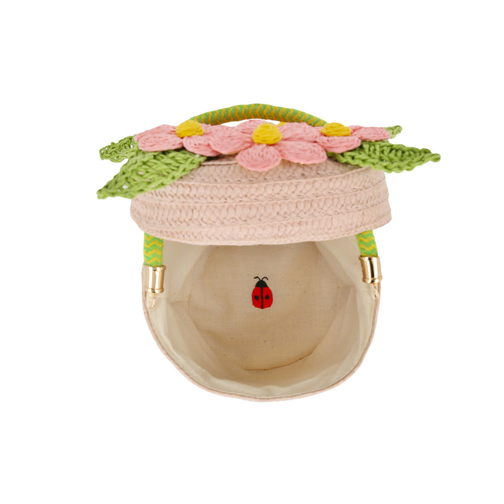 Canasto con forma de cesta con flores