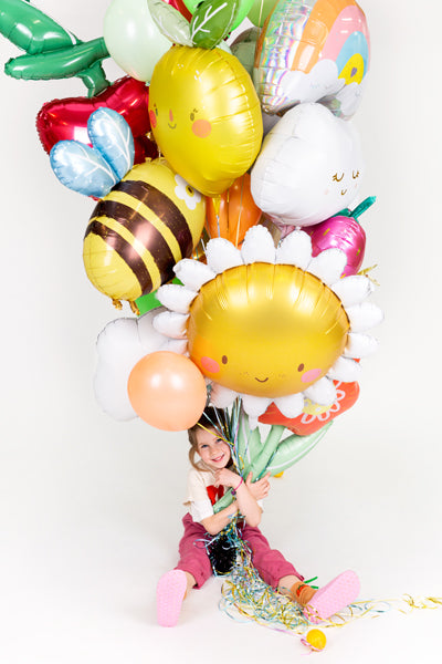 Globo metalizado - flor con carita y pétalos blancos