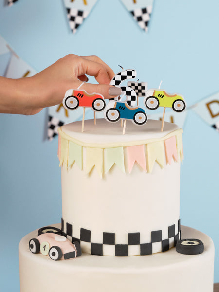 Velas autos de carrera