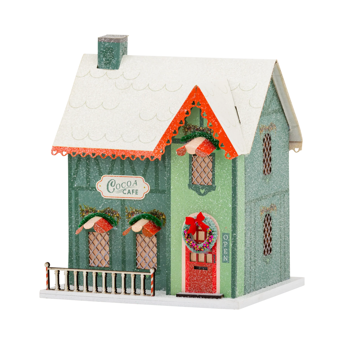 Casa aldea de Navidad iluminada - Cocoa Cafe
