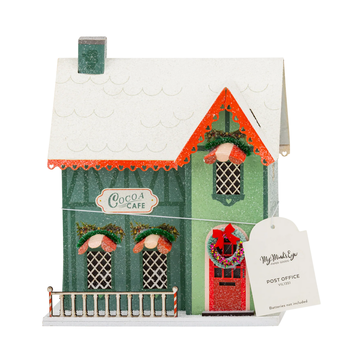 Casa aldea de Navidad iluminada - Cocoa Cafe