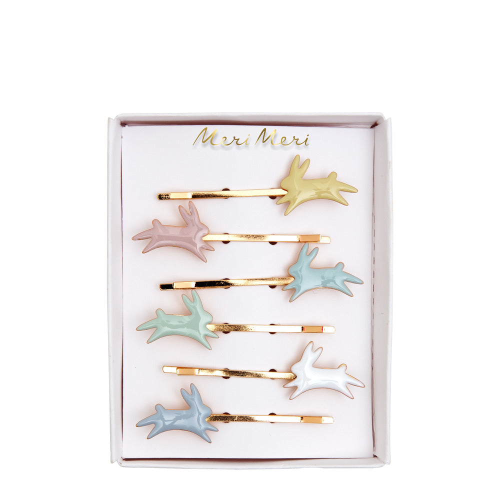 Pinzas - conejos saltando