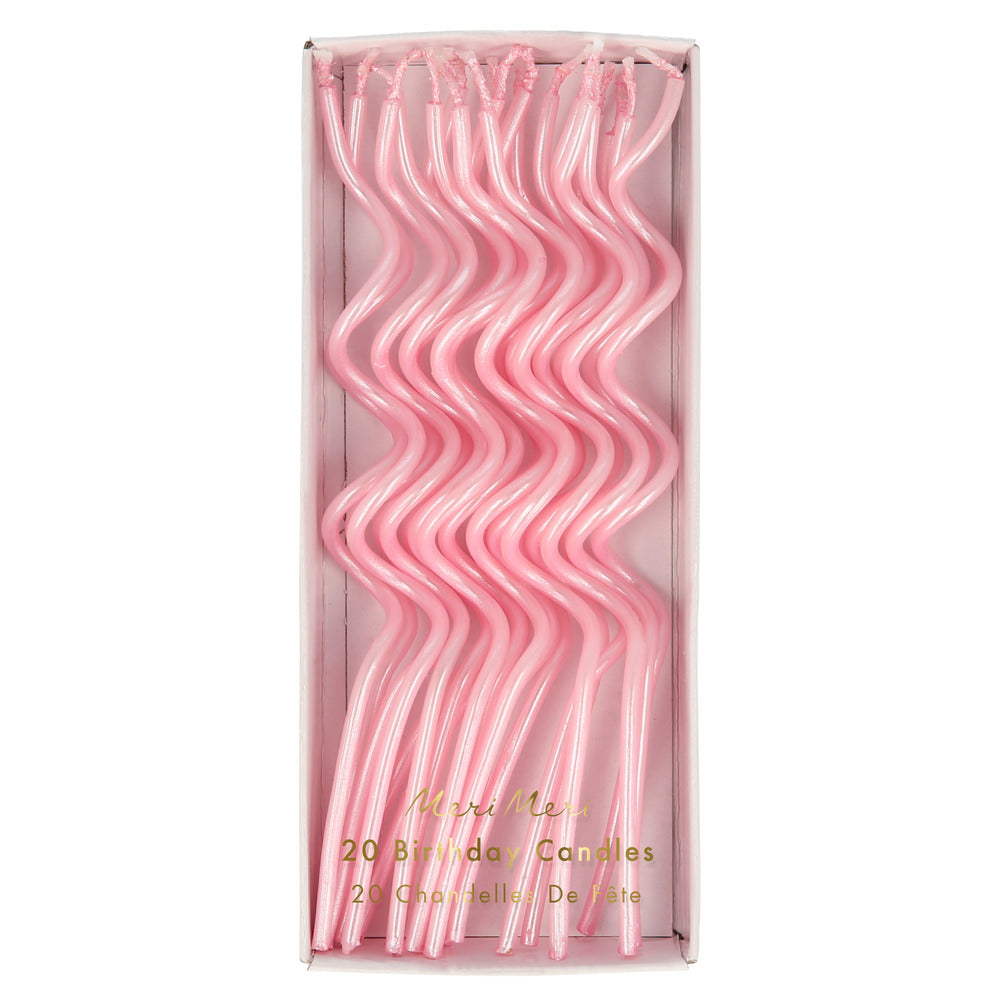 Velas delgadas torcidas rosadas