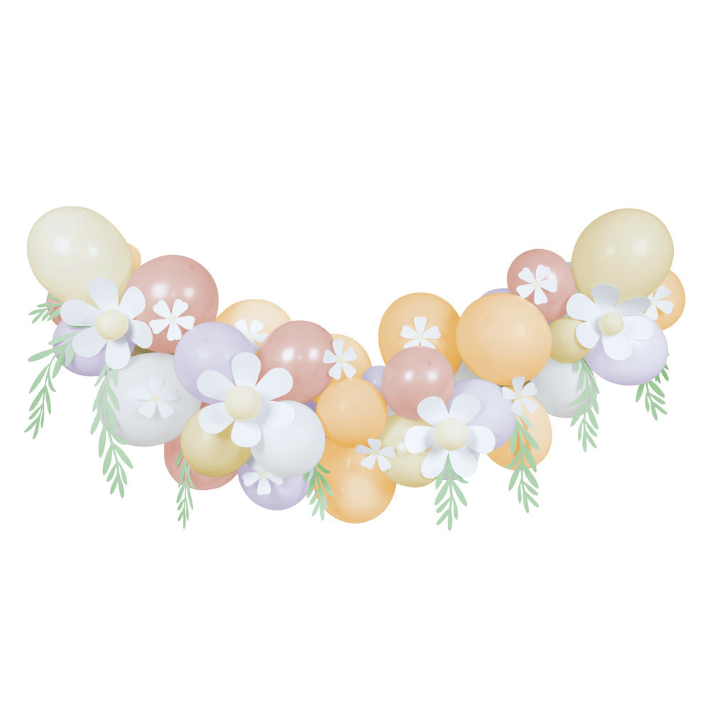 Guirnalda de globos pastel con margaritas