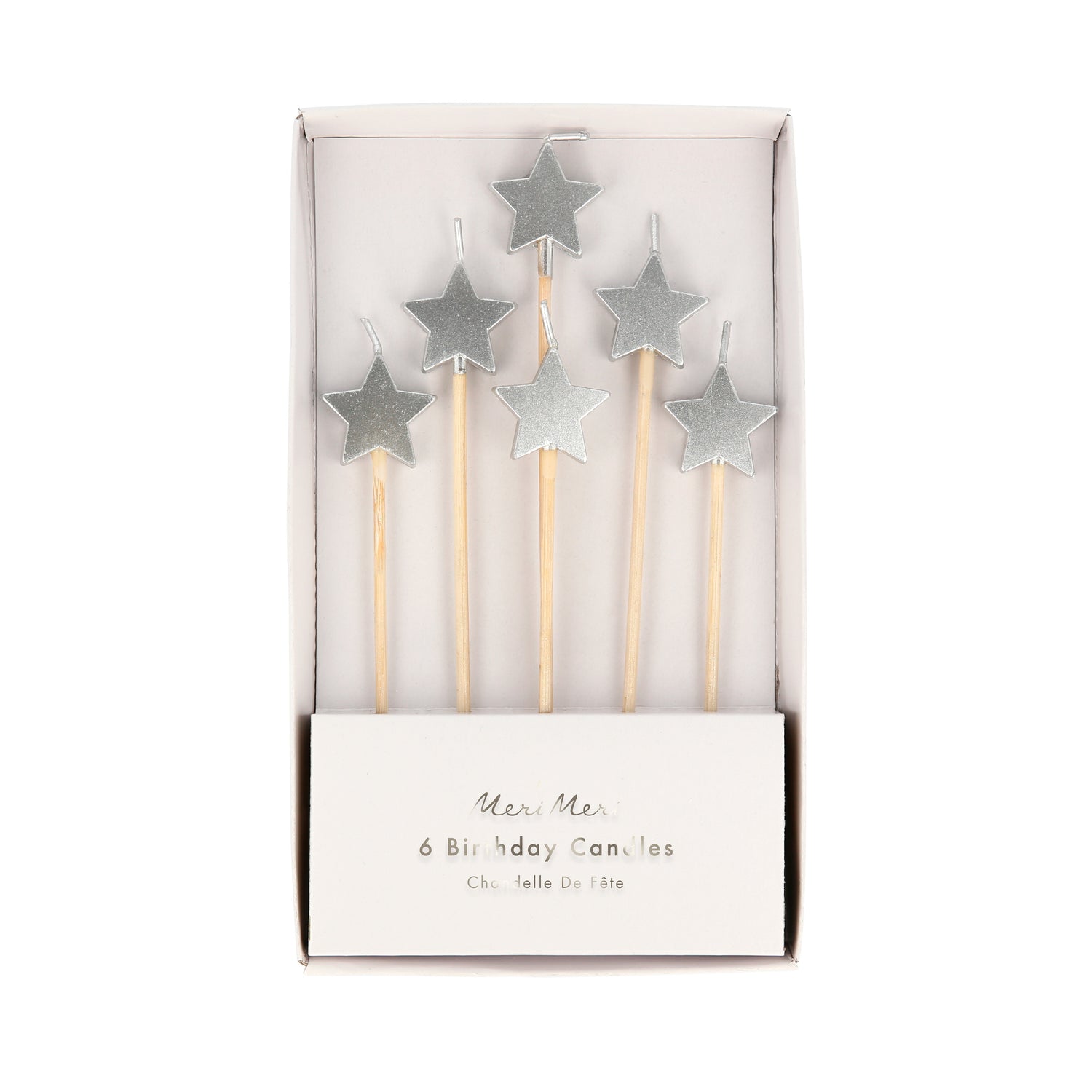 Velas pequeñas con forma de estrellas plateadas