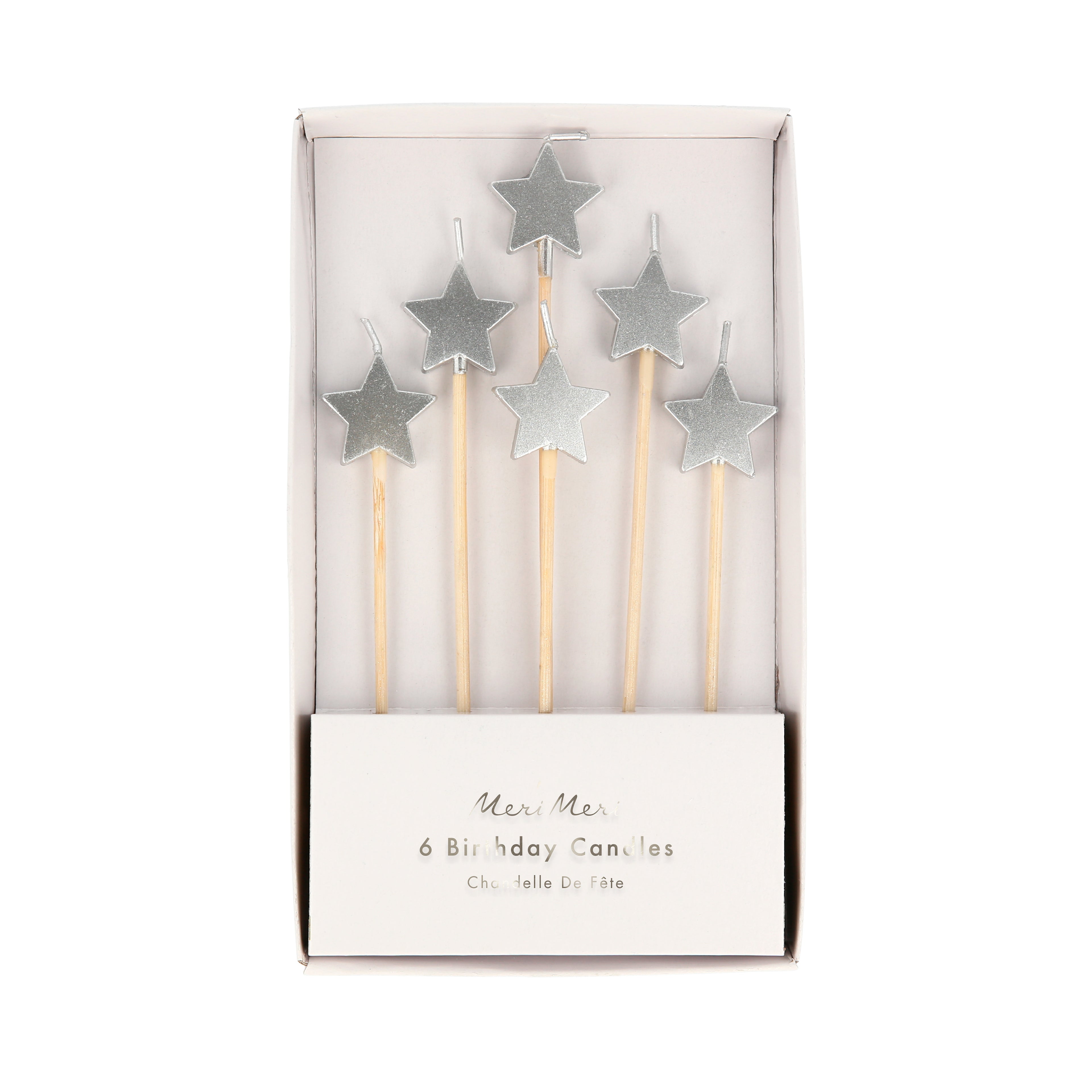 Velas pequeñas con forma de estrellas plateadas