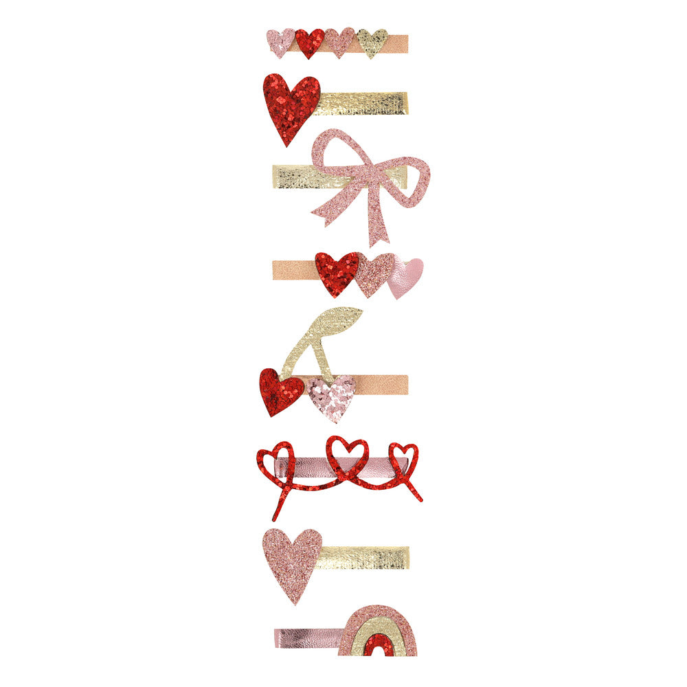 Pinches tipo clip con diseños de corazones