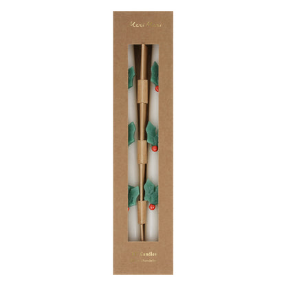Velas de mesa con hojas de muérdago
