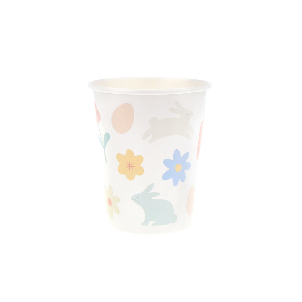 Vasos íconos de Pascua y flores