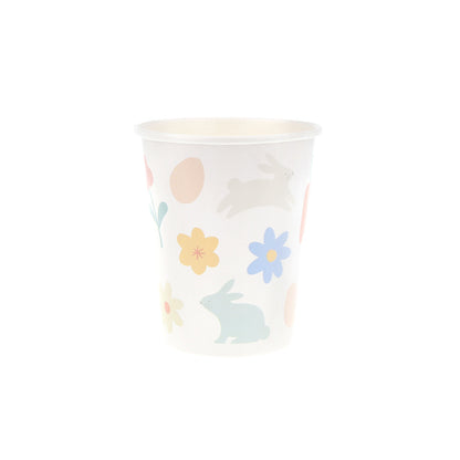 Vasos íconos de Pascua y flores
