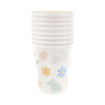 Vasos íconos de Pascua y flores