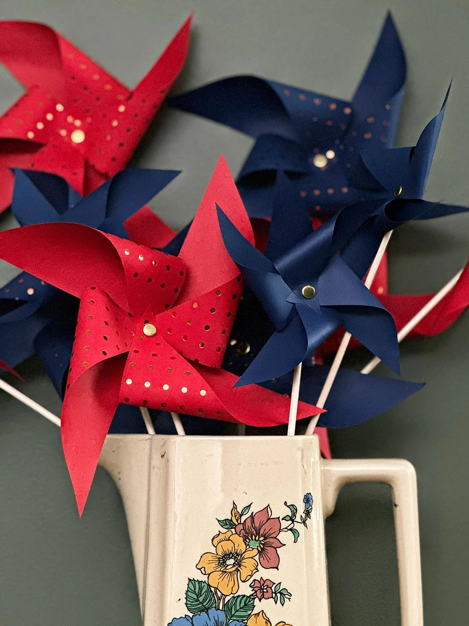 Remolinos decorativos de Papel - azul y rojo