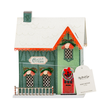 Casa aldea de Navidad iluminada - Cocoa Cafe