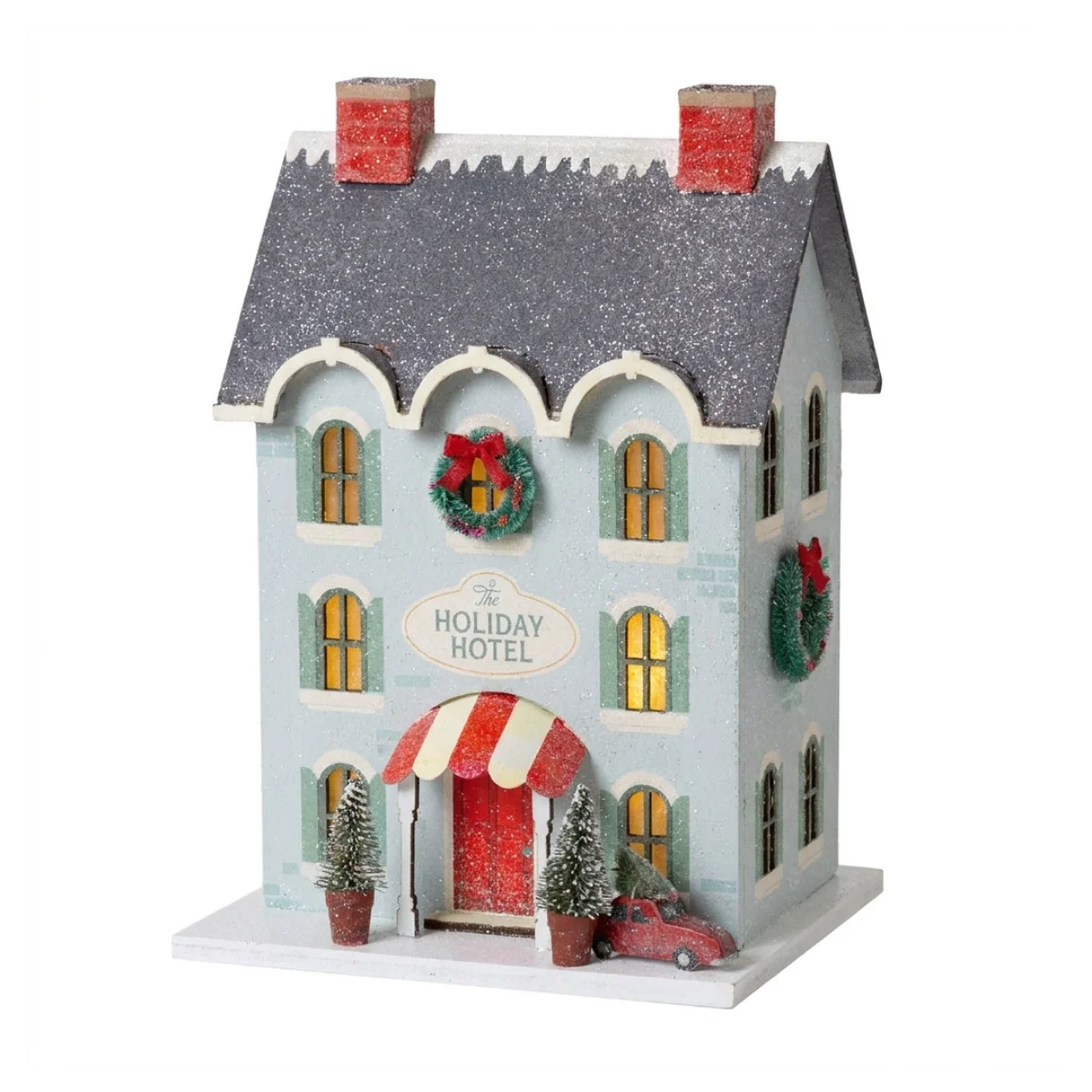 Casa aldea de Navidad iluminada - Holiday Hotel