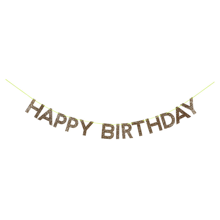 Esta guirnalda de Meri Meri, tiene las palabras &quot;Happy Birthday&quot; en color dorado glitter y es genial para cualquier celebración !  Viene con una cinta amarillo neón para colgar 