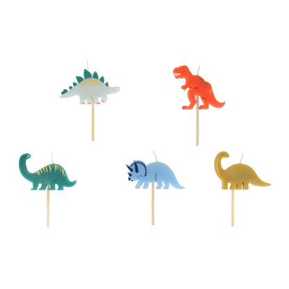 Velas con forma de dinosaurios coloridos